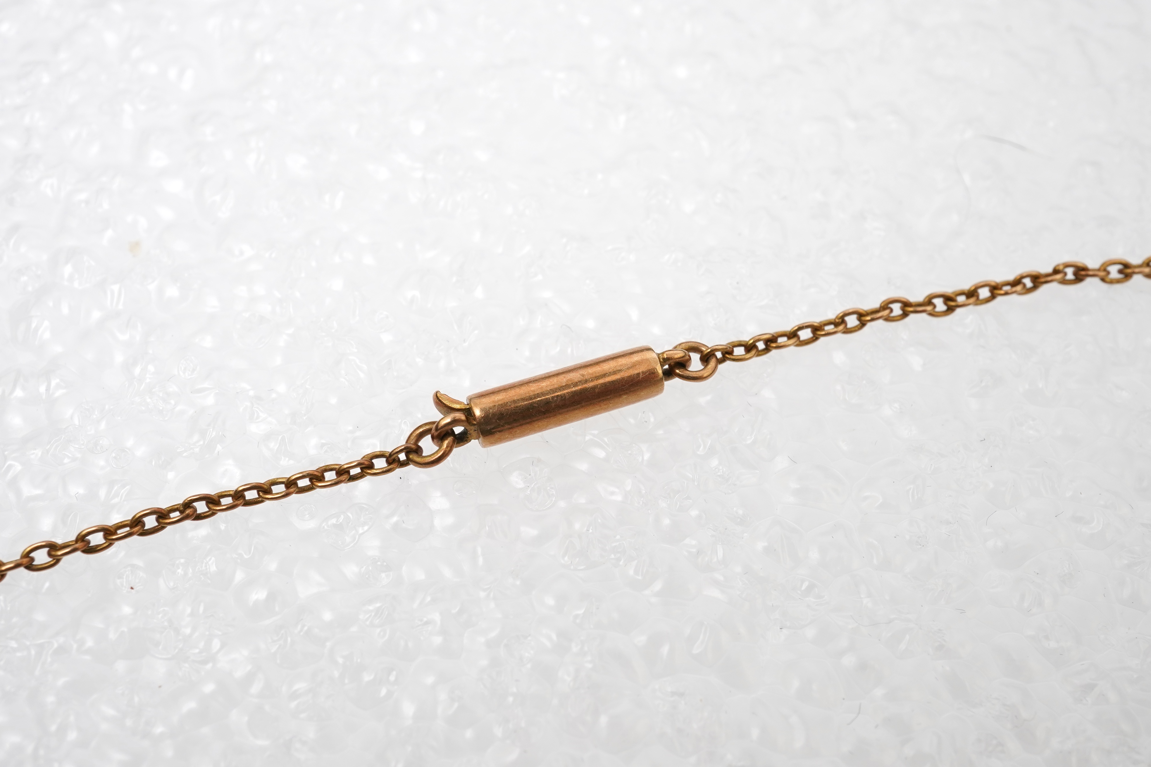 An Edwardian seed pearl and amethyst pendant/brooch, early 20th century